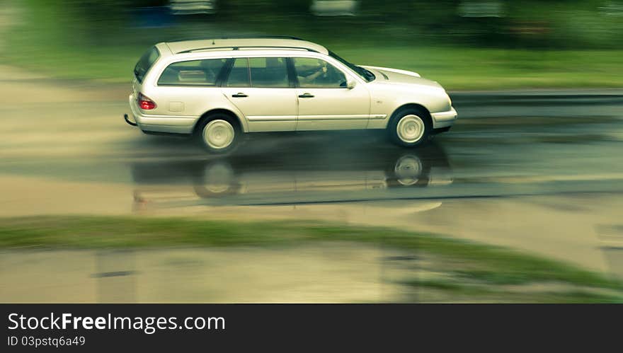 An image of car moving very fast. An image of car moving very fast