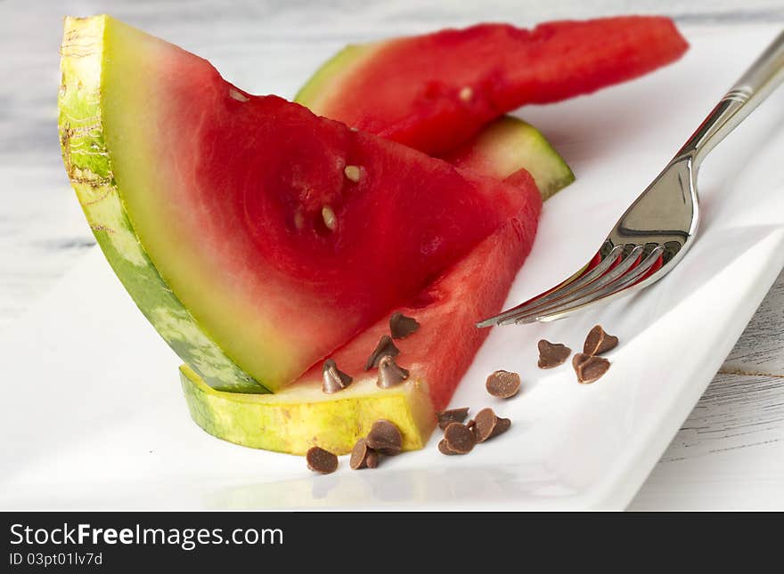 Melon Slice on a white plate