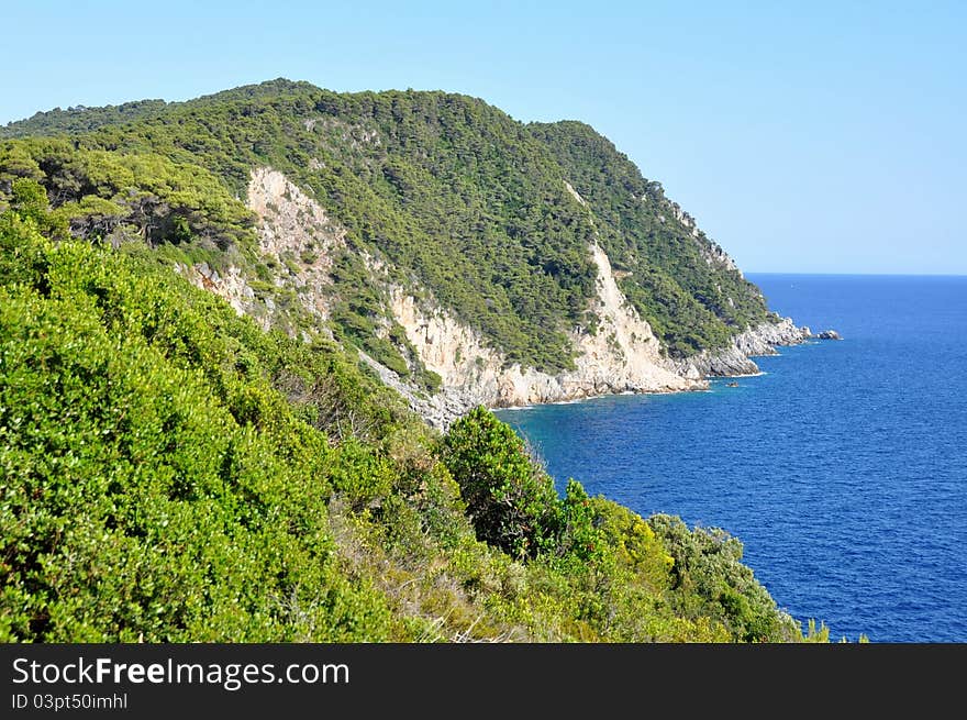 The view from Lopud island to the cliff shore & the open sea. The view from Lopud island to the cliff shore & the open sea.