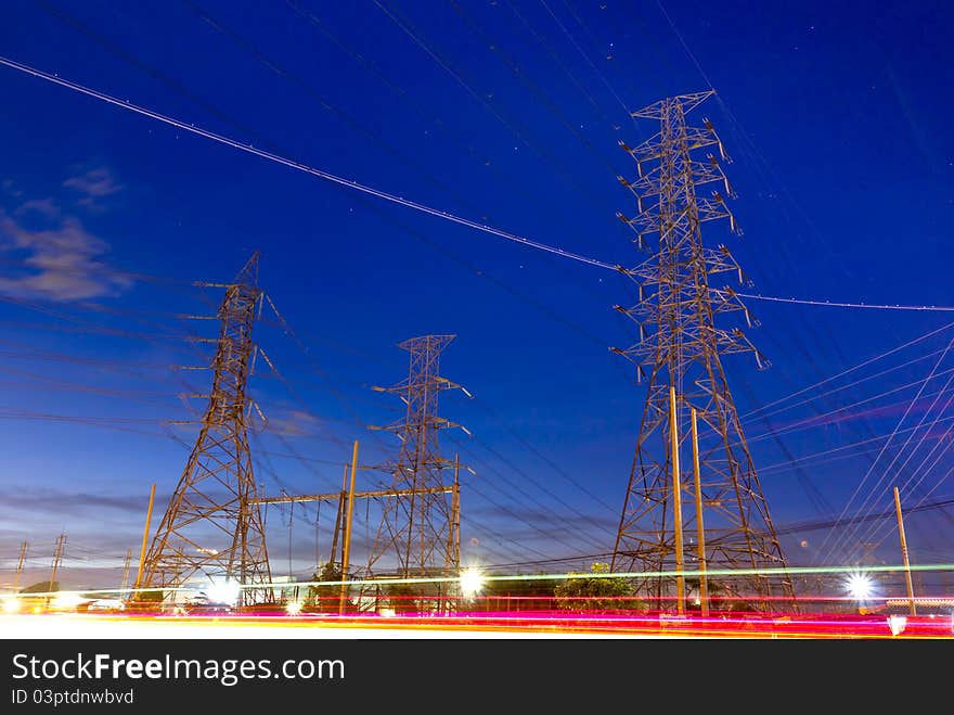 Electric high voltage power post and blue sky