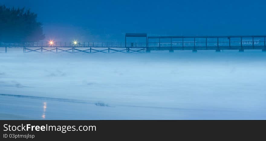 Image of pier's part early in the morning.