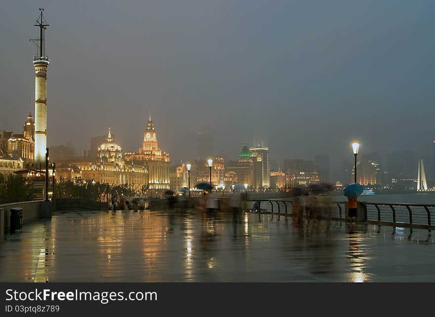 Image of Bund in Shanghai at night and rain, China