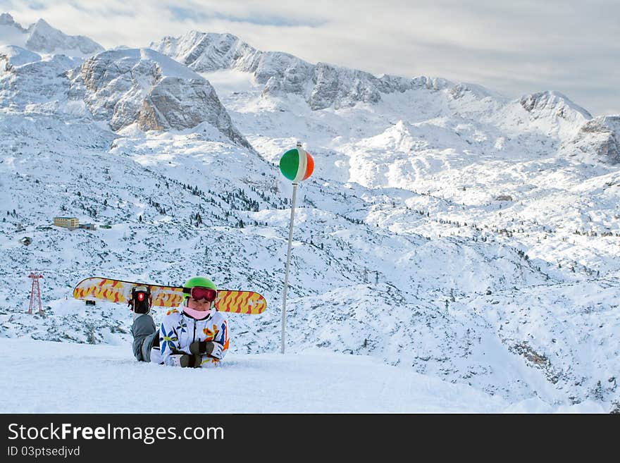 Snowboard and Ski Extreeme sport on the European Alps. Above beautiful sky on the snowy mountain.