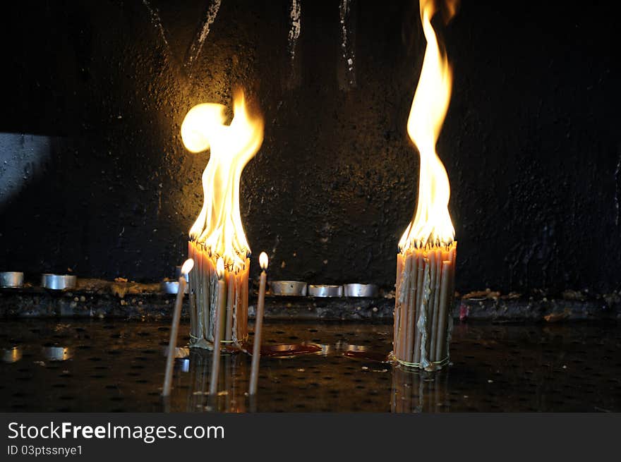 Religious Candles Burning