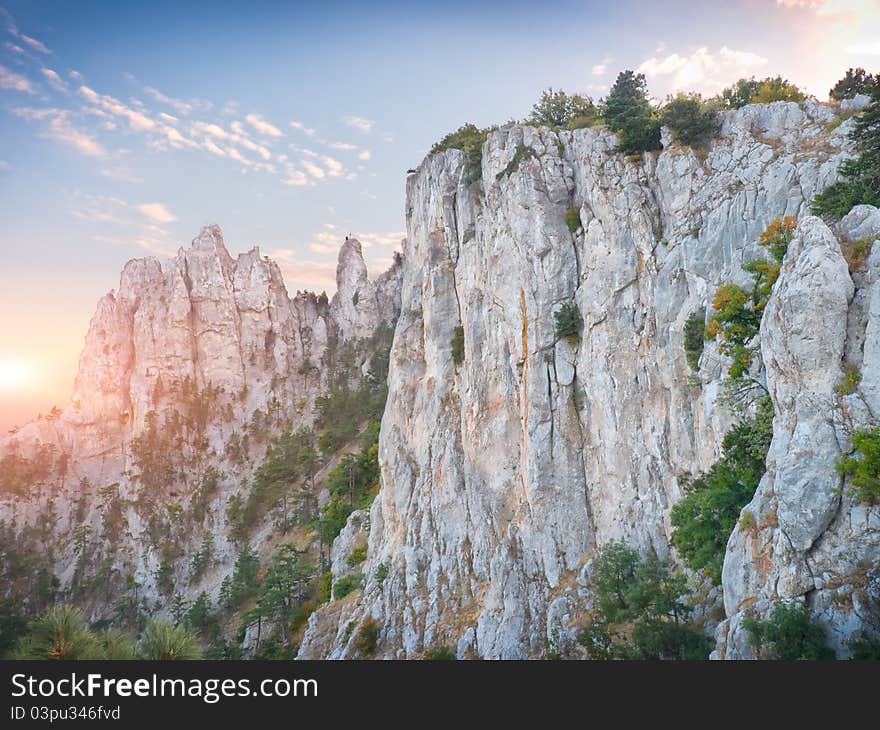 Mountain range in the background a sunrise