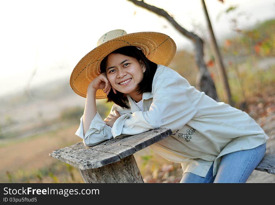 Portrait of thai farmer lady in a field