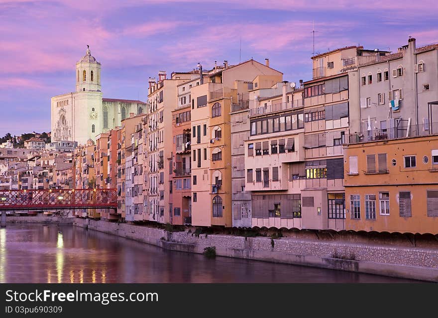 A view from Girona's Cathedral with the colourful houses and the eiffel bridge in the left side. A view from Girona's Cathedral with the colourful houses and the eiffel bridge in the left side.