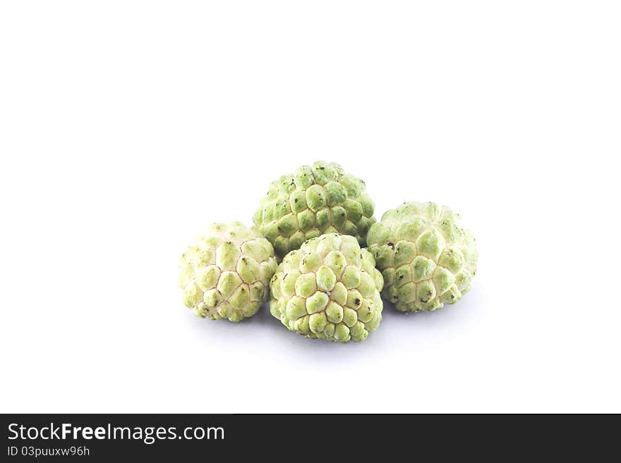 Custard apples group on white background with isolate. Custard apples group on white background with isolate.