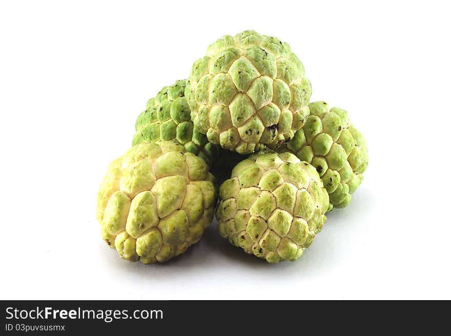 Custard apples group on white background with isolate. Custard apples group on white background with isolate.