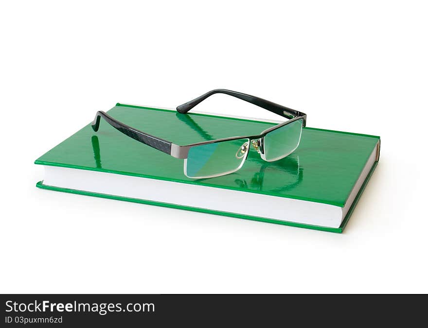 Book with eyeglasses