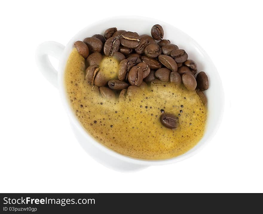 Yin and Yang in a cup of coffee isolated on white