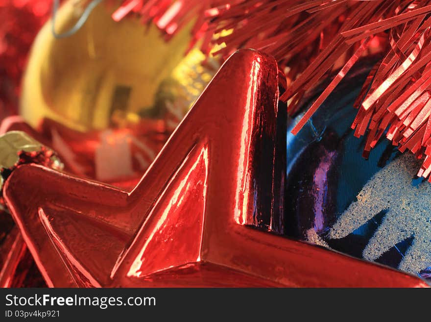 Abstract Christmas image featuring colorful Christmas decorations.