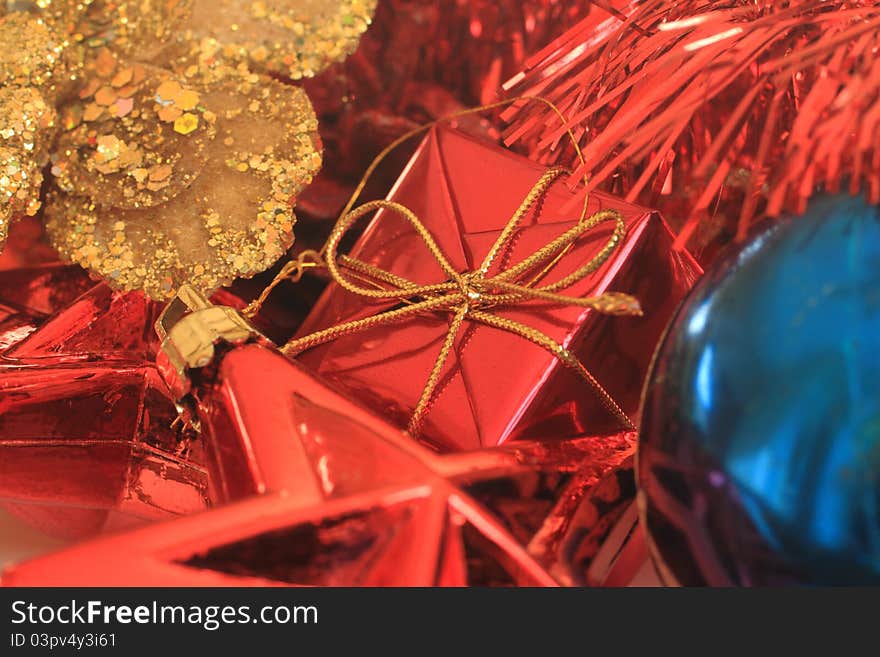 An abstract Christmas image featuring colorful Christmas decorations.