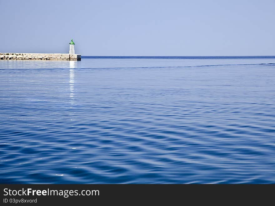 Sea breaker and ligthouse croatia