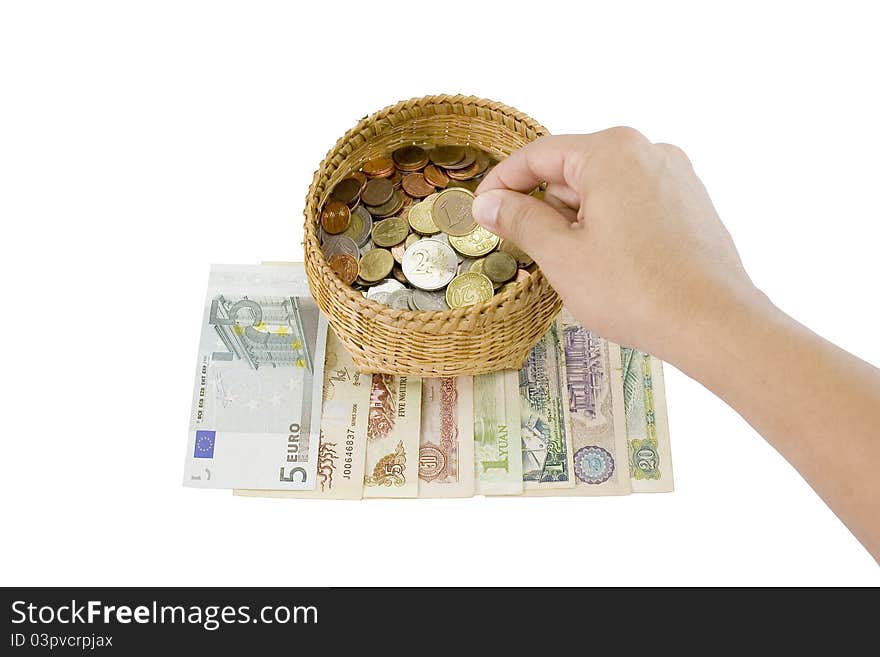 Saving money isolated with coin into a basket on bank notes.