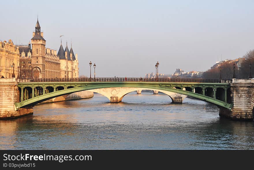 Notre-Dame bridge and the Conciergerie in Paris, France