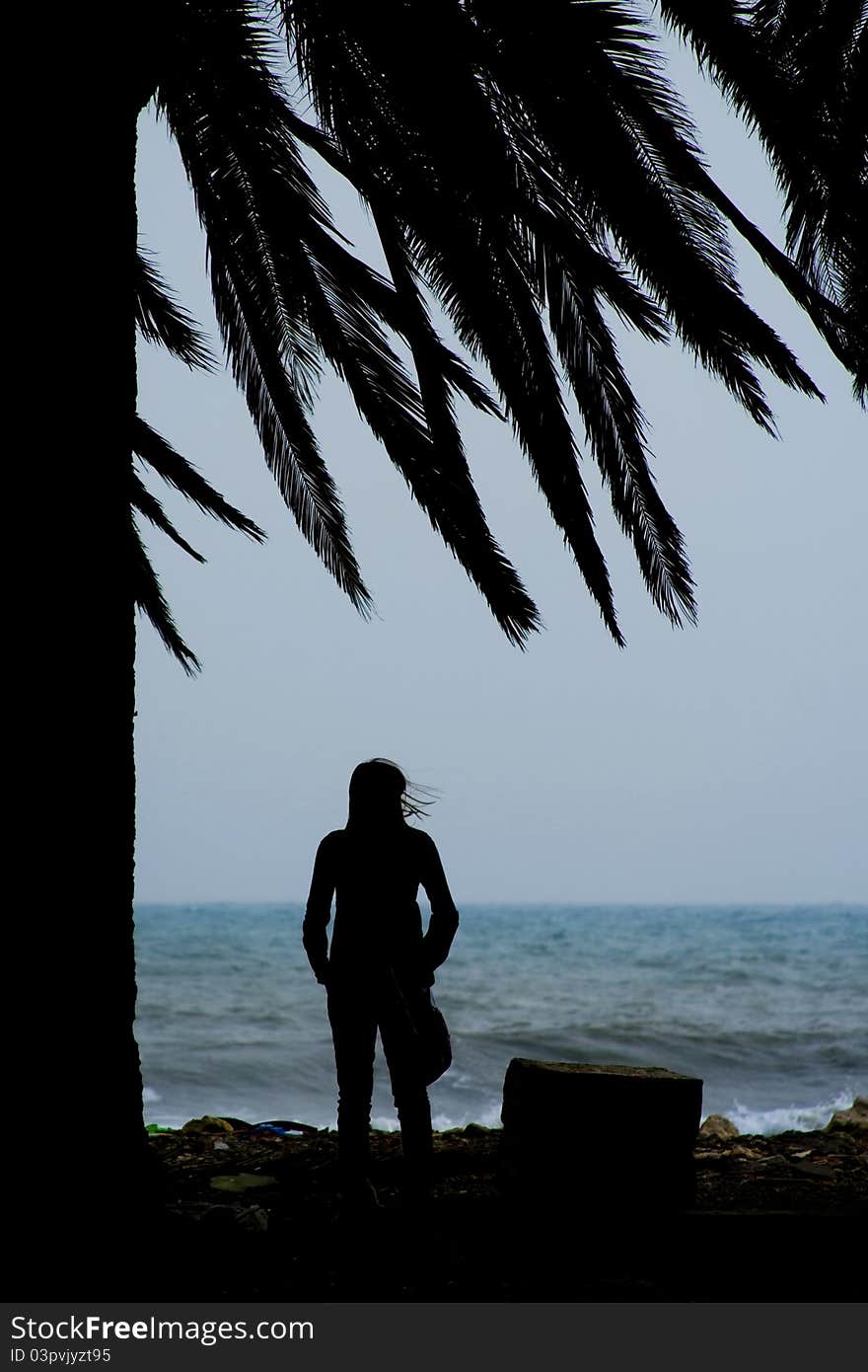 Girl watching the sea