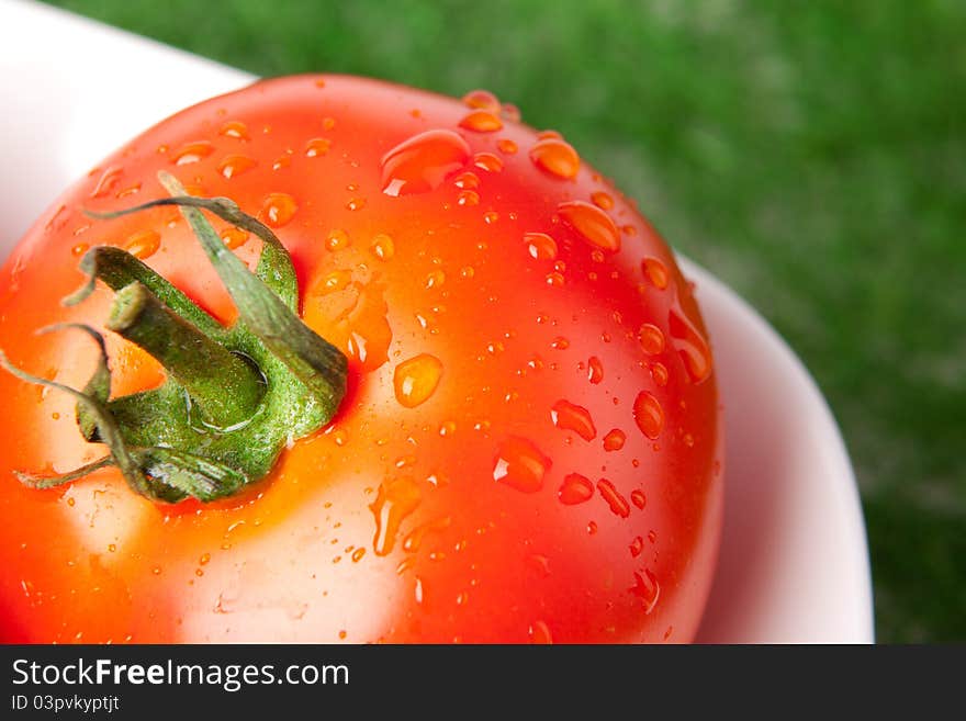 Fresh Wet Tomato With Green Leaf