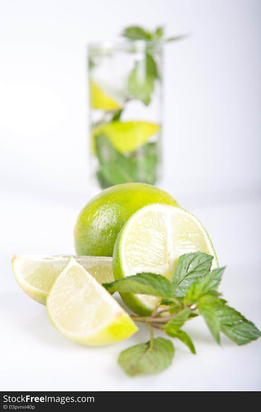 Fresh mojito cocktail on green background. Fresh mojito cocktail on green background