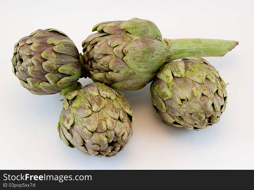 Artichokes four isolated on white background