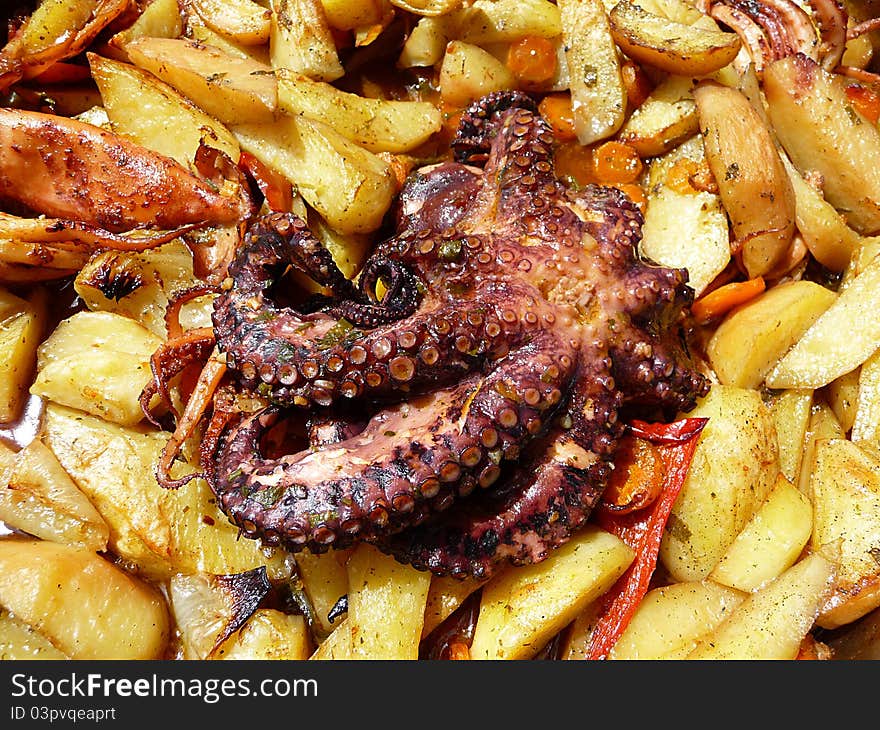 Octopussy With Potato Baked In Olive Oil