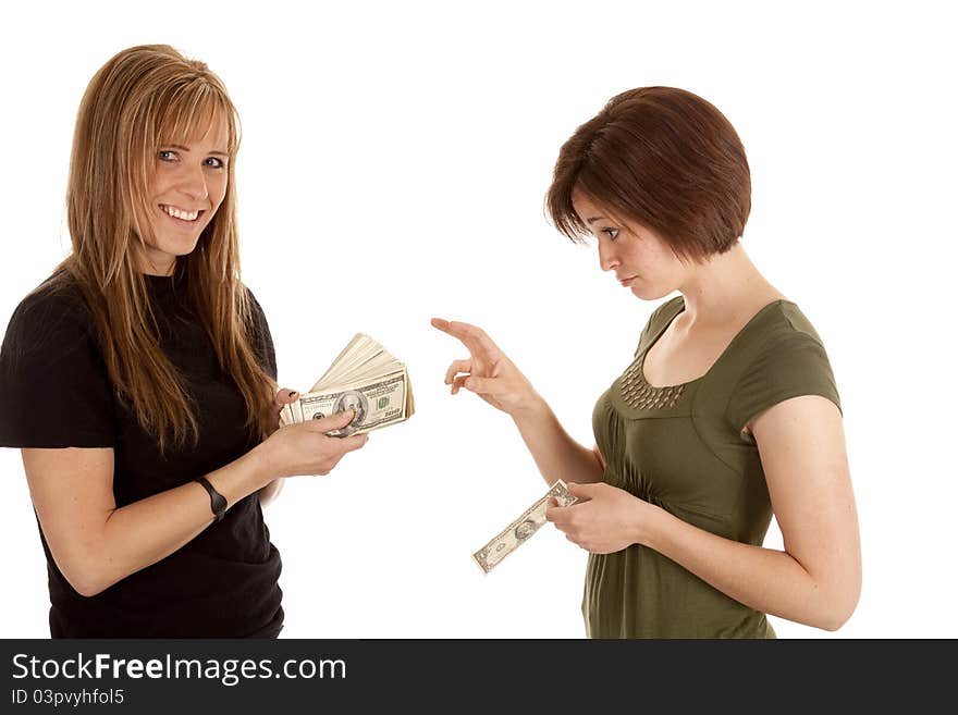 A women wishing she had some money from the other women. A women wishing she had some money from the other women.