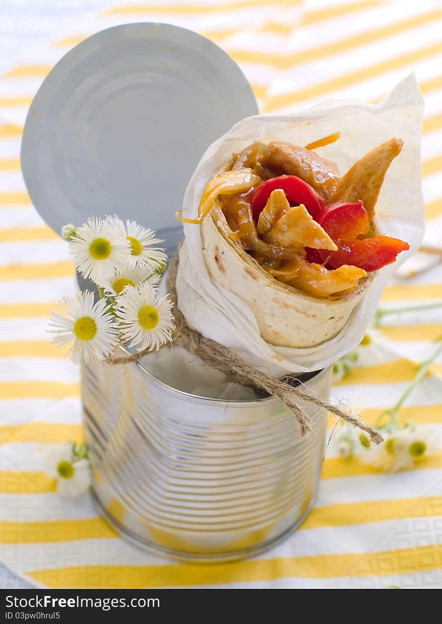 Wrap with chicken and vegetables. Selective focus