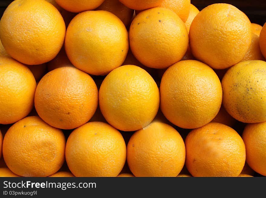 Fresh oranges on display for sale at a shop, India. Fresh oranges on display for sale at a shop, India