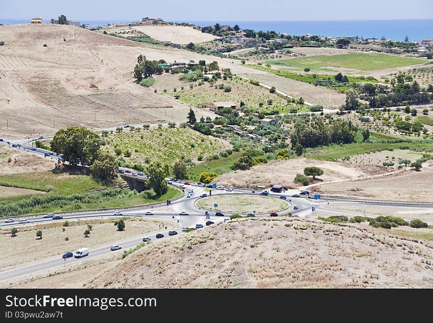 Traffic in countryside on Mediterranean coast near Agrigento, Sicily. Traffic in countryside on Mediterranean coast near Agrigento, Sicily