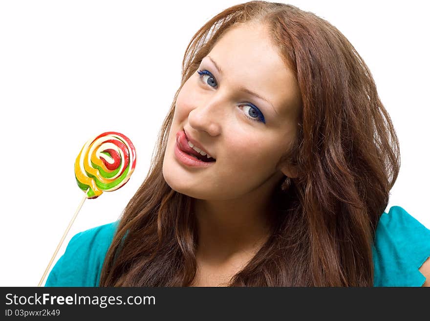 Lovely young woman with lolipop