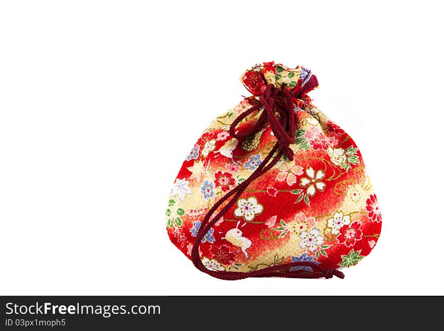 Small red bag for presents isolated on white background