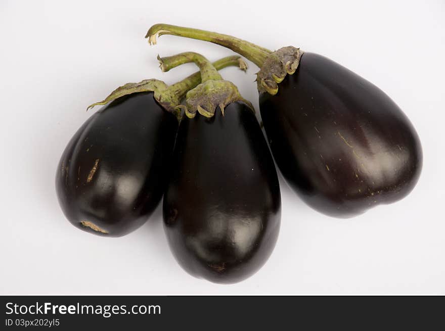 Three Eggplants on white background