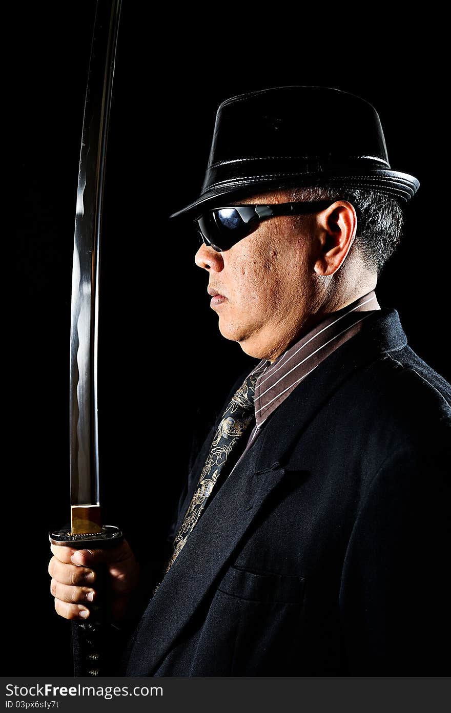 Japanese Yakuza with samurai sword