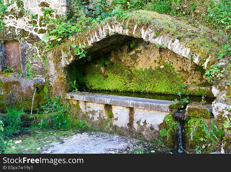 The old fountain near rome