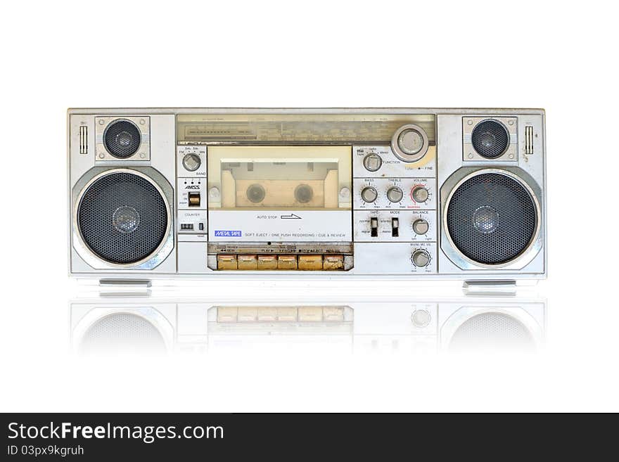 Vintage radio and cassette tape player on white background with clipping path. Vintage radio and cassette tape player on white background with clipping path.