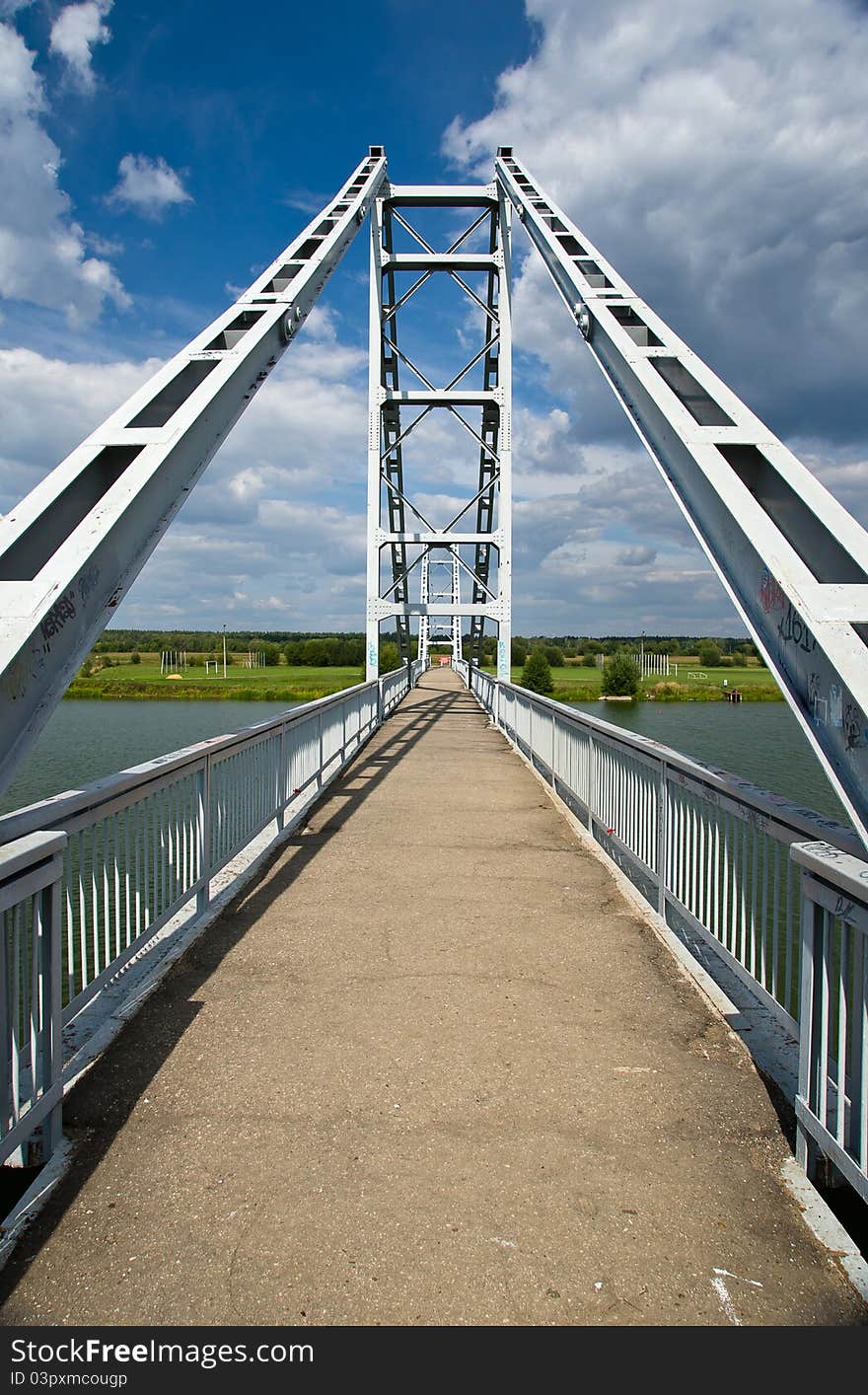 Modern steel bridge over the river