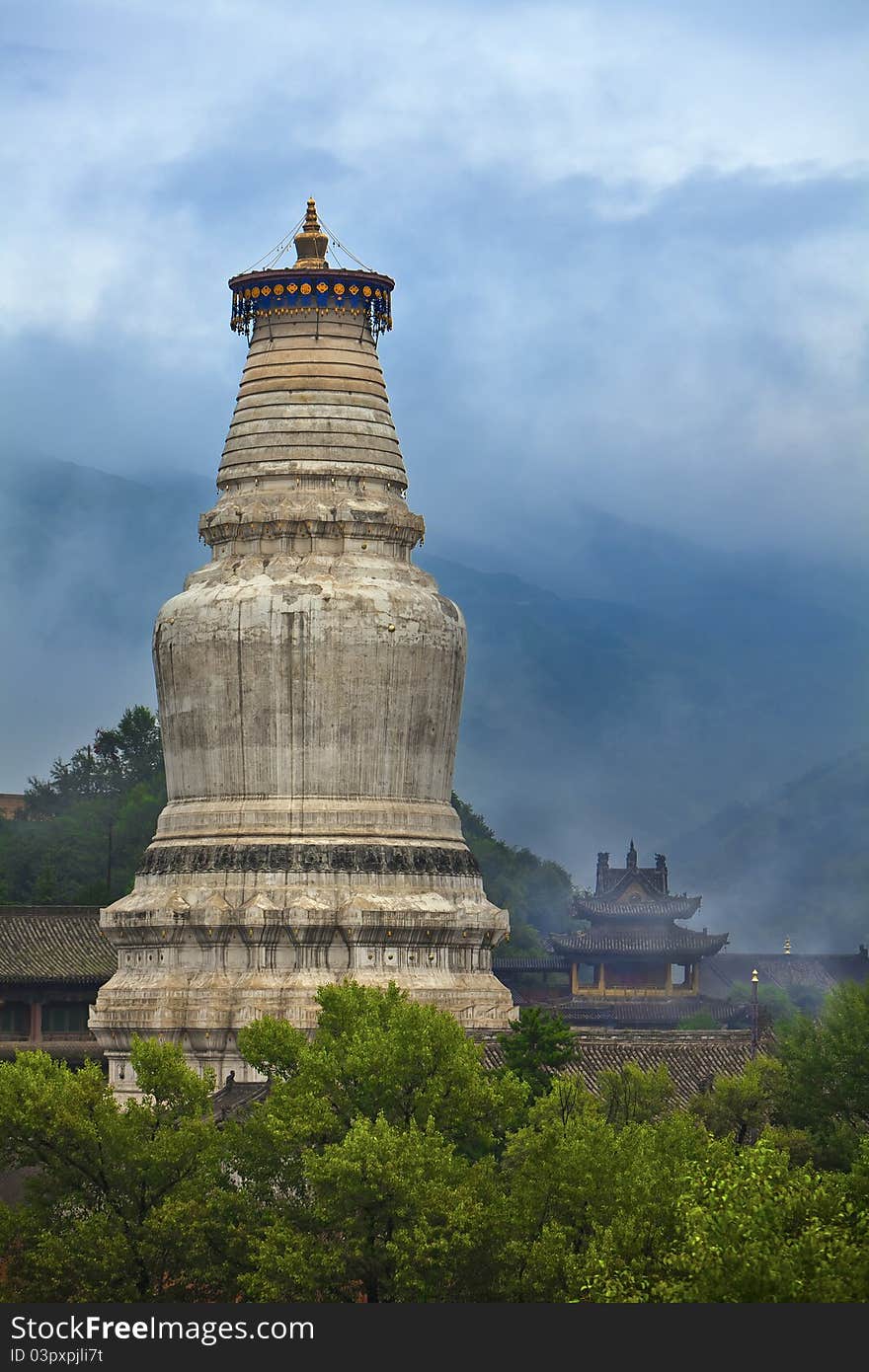 The chinese tower in front of a temple, this tower has already had a history of a thousand years.