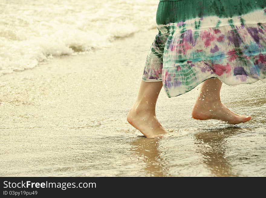 Girl run on the beach