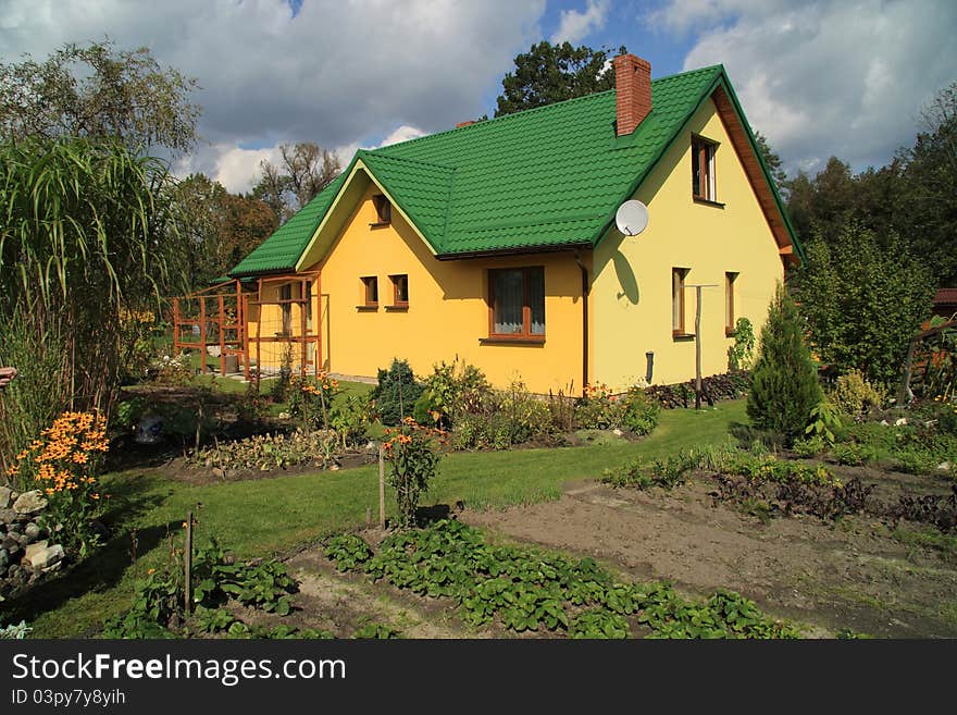 House with a green roof