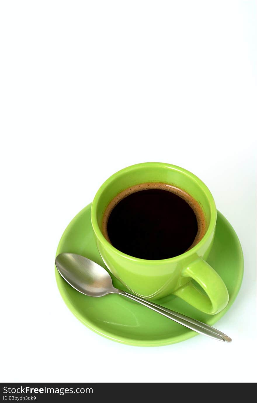 Green cup of coffee on a white background