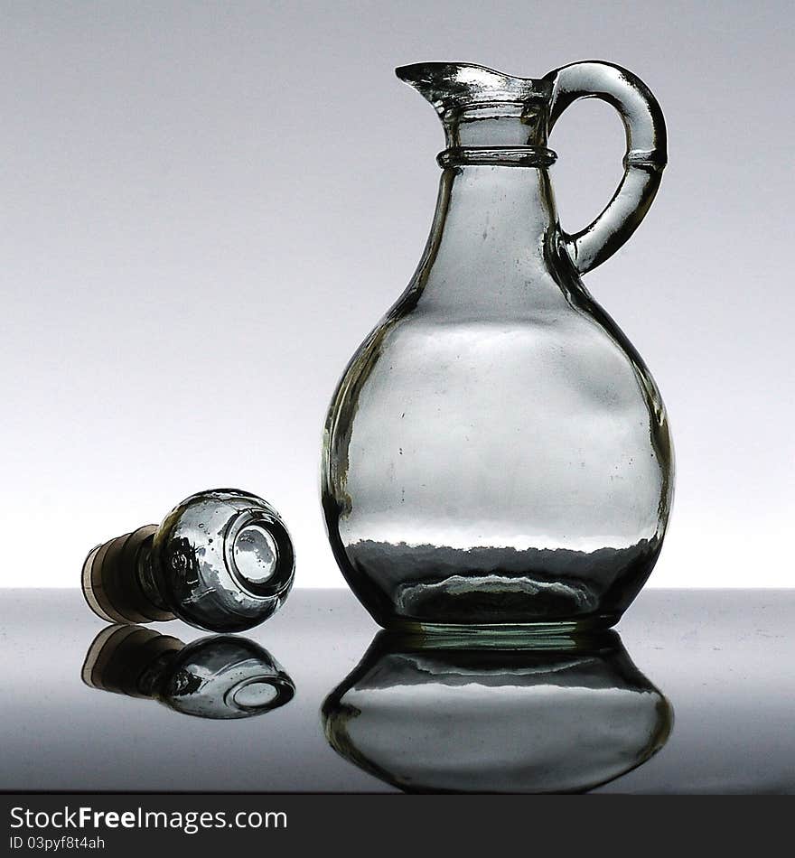 A empty salad or olive oil bottle with stopper. A empty salad or olive oil bottle with stopper