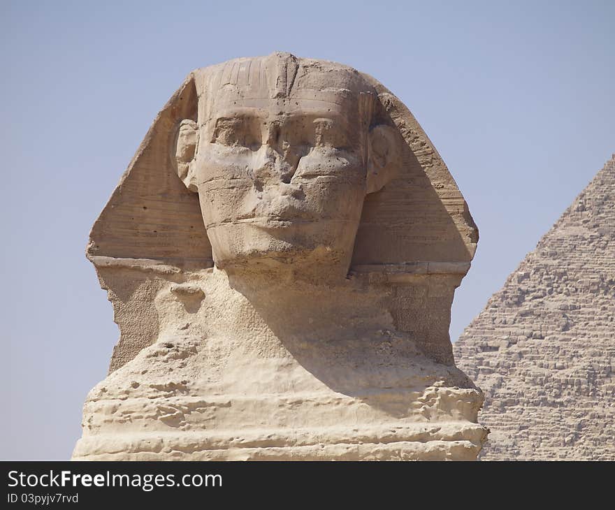 Sphinx and Pyramid of Chephren in Giza funerary complex in the city of Cairo, Egypt. Sphinx and Pyramid of Chephren in Giza funerary complex in the city of Cairo, Egypt