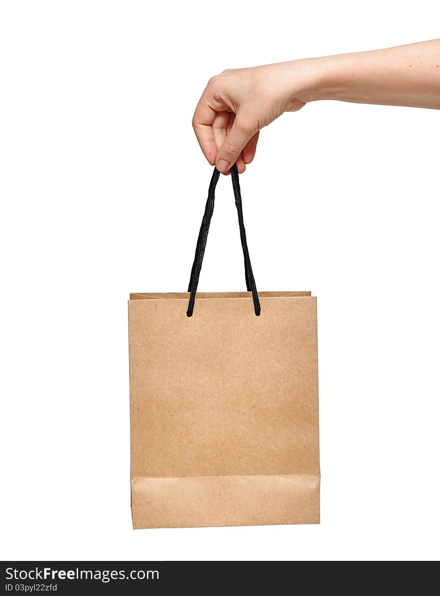 Hand with shopping bag isolated on white background