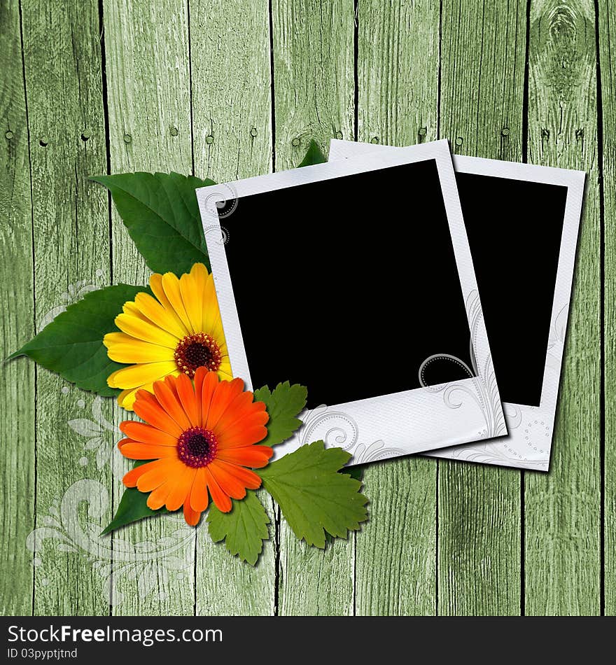 Two photo frames and flowers on wooden texture. Two photo frames and flowers on wooden texture