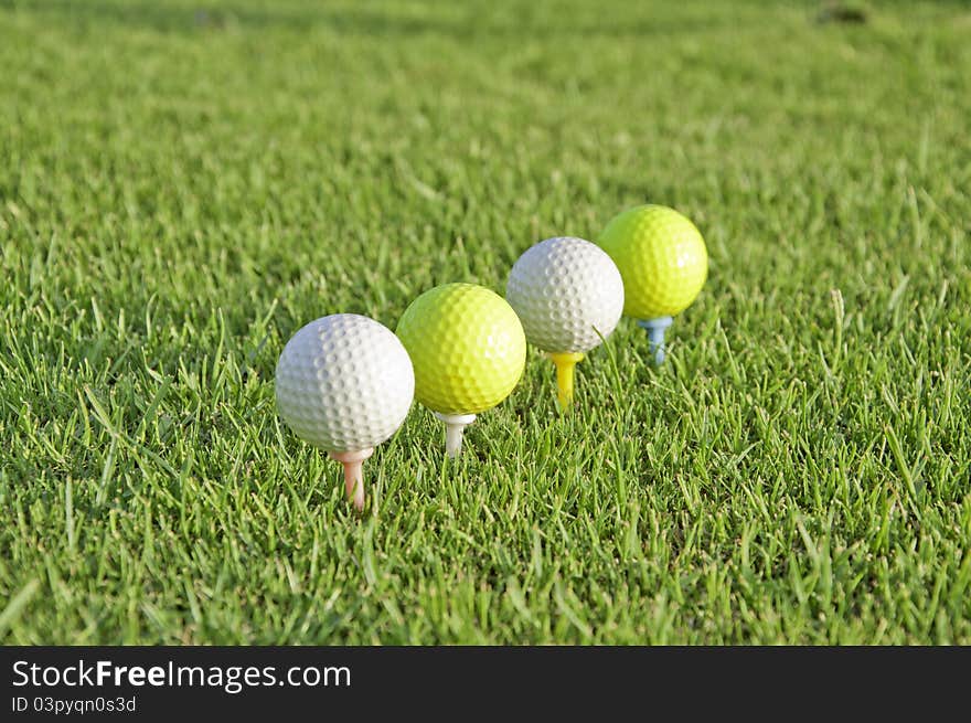 Four balls of golf.