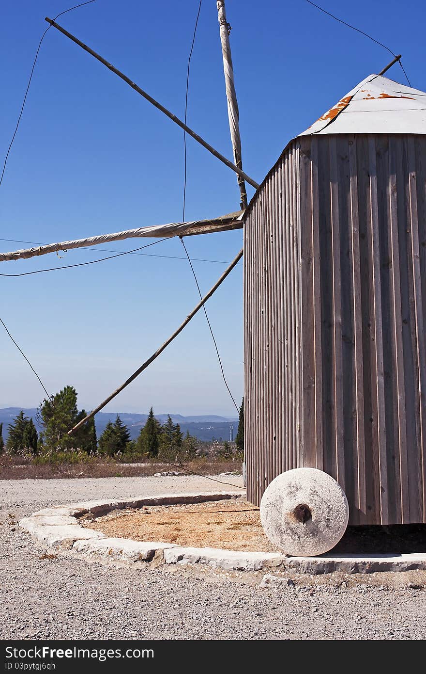 Rare and unique Portuguese traditional windmill with the particularity of weathervane, turning on itself to capture the wind. Rare and unique Portuguese traditional windmill with the particularity of weathervane, turning on itself to capture the wind