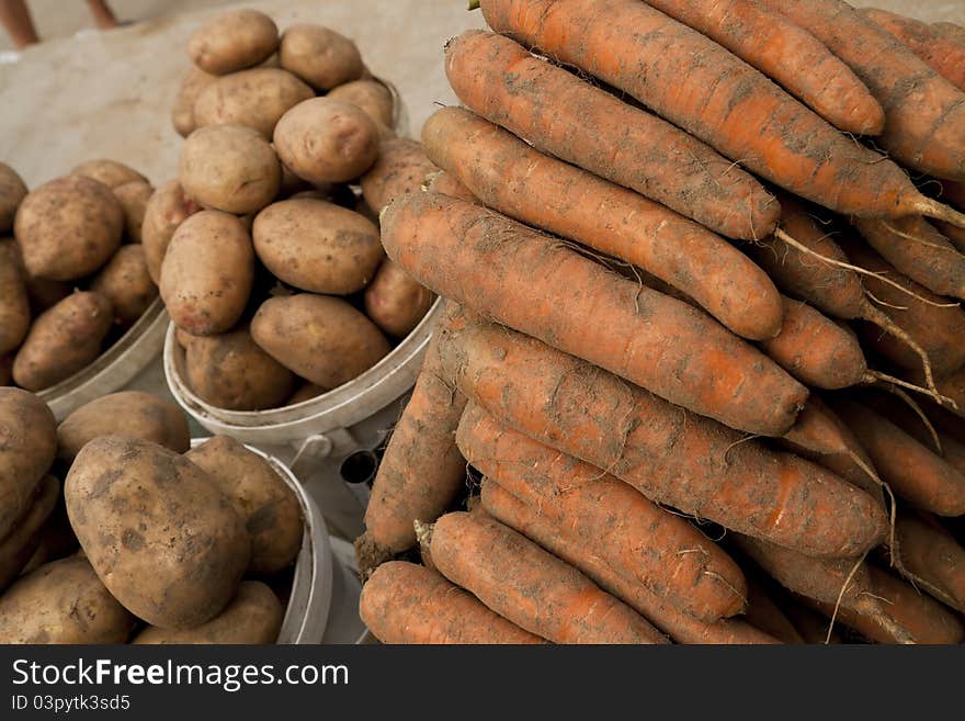 Potato and carrot on local market