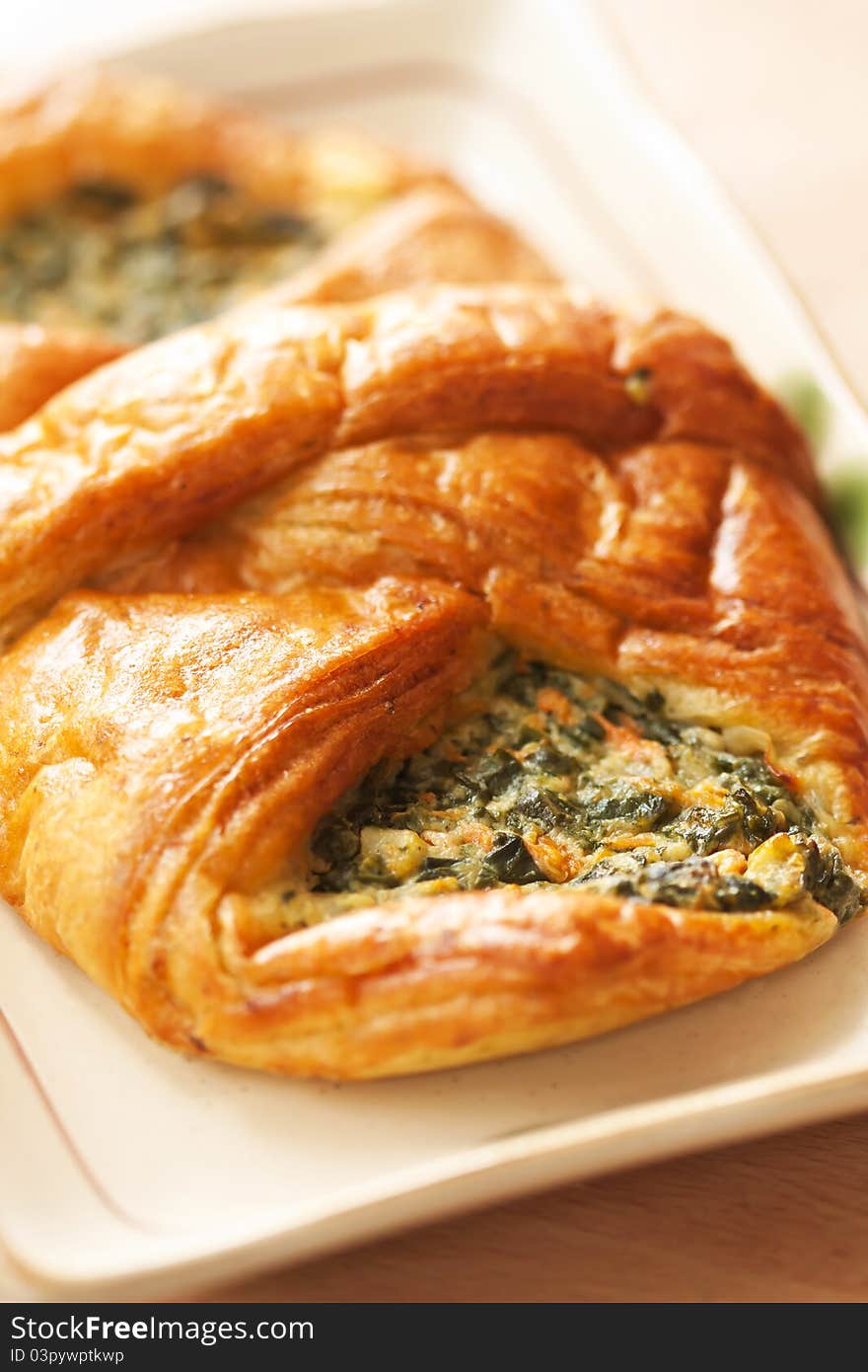 Delicious spinach croissant close up with macro lens