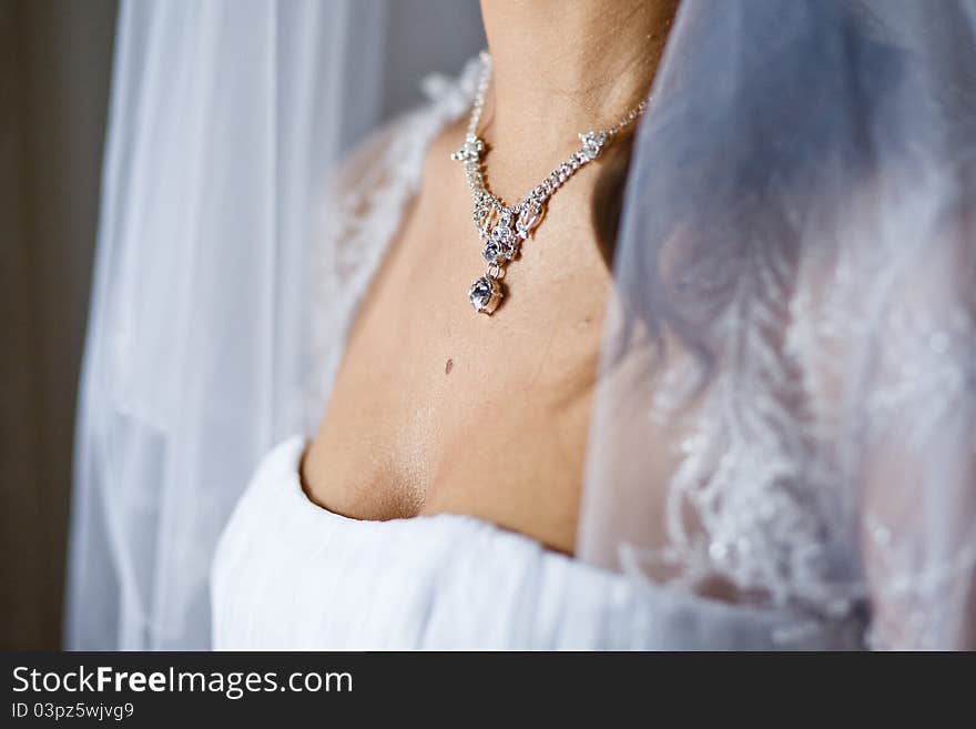 Adornment on neck of young bride