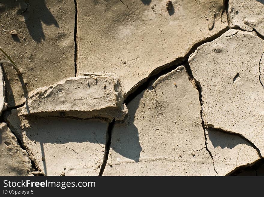 Detail of sandy soil breaking up for lack of water. Detail of sandy soil breaking up for lack of water